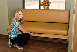 Photo of Valerie opening the slide-a-bed.